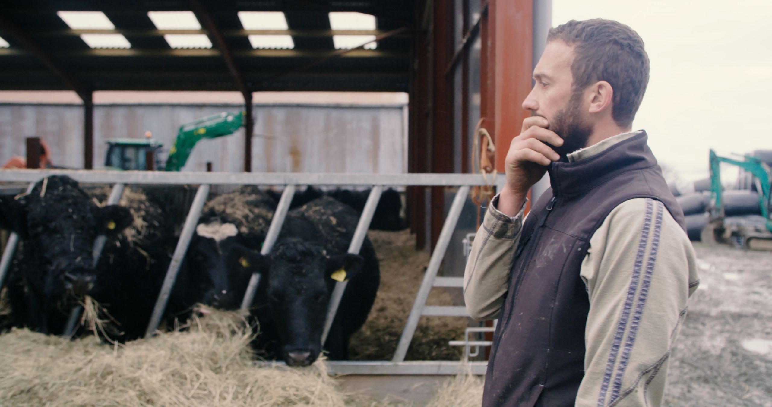 Farmer Geraint Davies standing in front of a cattle shed on his farm at Fedw Arian just outside Bala